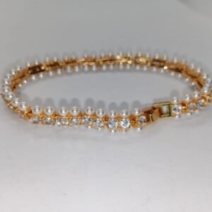 White Gemstone Elegance Bracelet with Gold Accents